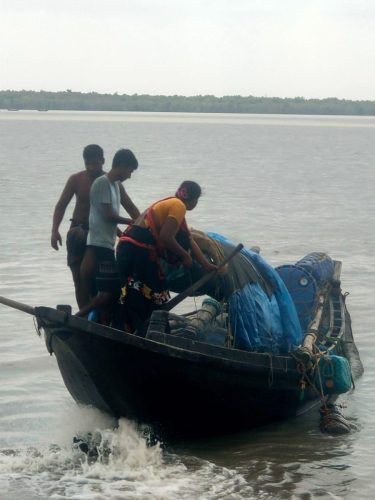 Female Fisherman Start Journey For Cathing Fish.